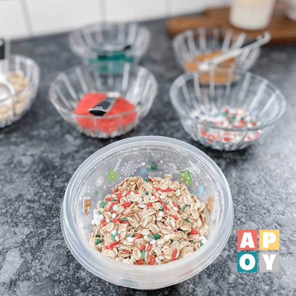 reindeer food recipe,christmas reindeer food,Christmas Eve traditions,how to make reindeer food,Christmas activities,things to do with kids on Christmas Eve,holiday traditions,holiday memories,fine motor activities,seasonal activities,scooping activities for kids,kids in the kitchen,toddler learning activities