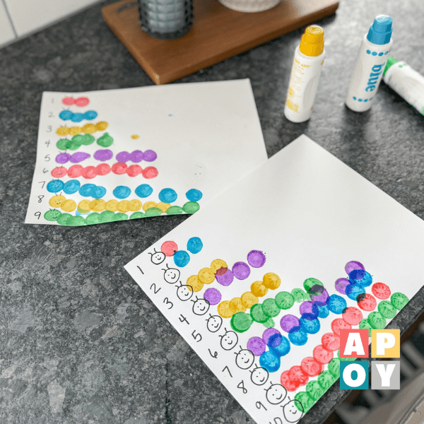 dot marker counting caterpillars on counter