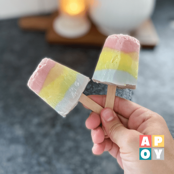easy rainbow popsicles using dixie cups,rainbow pudding popsicles,rainbow popsicle recipe,quick dixie cup popsicles,kids popsicle recipe,how to make homemade popsicles,kid-friendly popsicle recipes