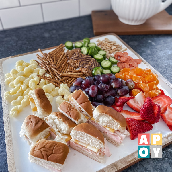 lunch tray with a variety of food on kitchen counter